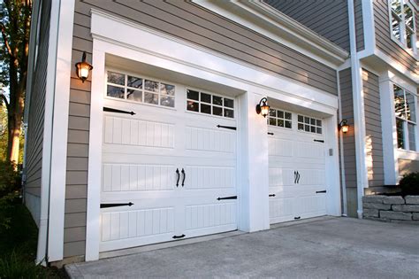 Cloplay garage doors - They selected these doors in a Walnut faux wood finish with recessed panels, four paned windows, and decorative hardware. We also upgraded the interior of the garage with new Linear LDCO863B openers for quieter and more reliably operation. We couldn’t be happier with the way this Clopay Walnut Garage Doors project turned out!